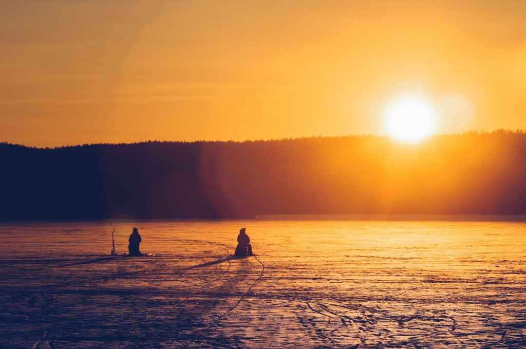 People Ice fishing